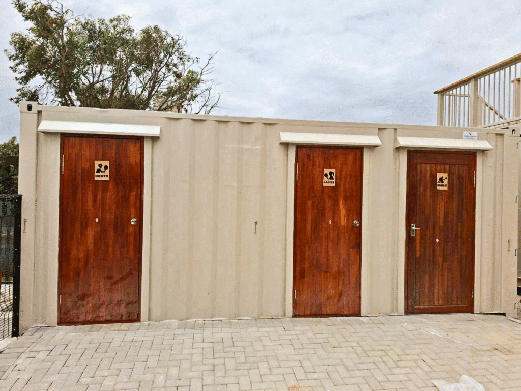 Ablution container with separate male and female toilets